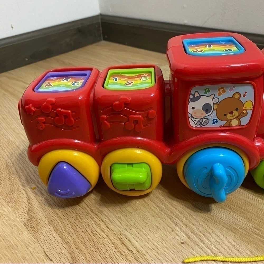 V-tech Roll & Surprise Animal Train Pop Up Music